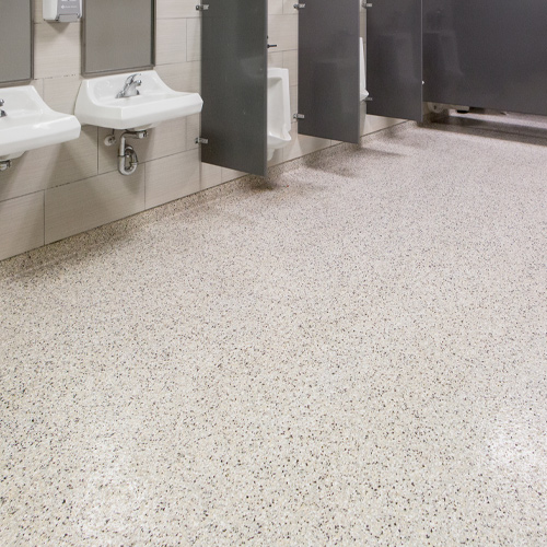 men's bathroom with beige flaked epoxy floor coating